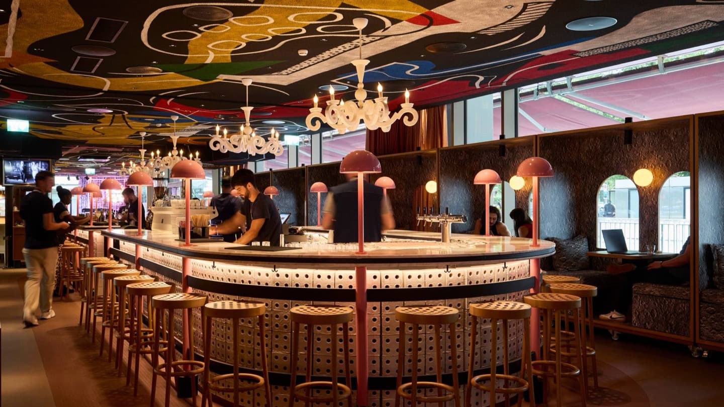 The bar under the painted ceiling at Mama Shelter Zürich