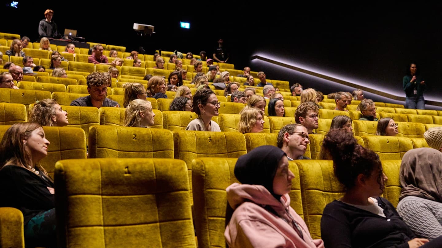 A full house in one of KINOKONI's mustard-yellow auditoriums