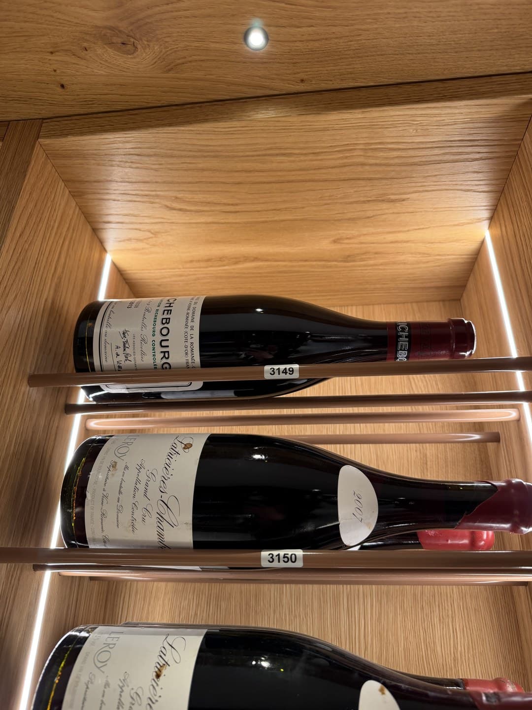 Close-up of the Richebourg and Latricières-Chambertin bottles