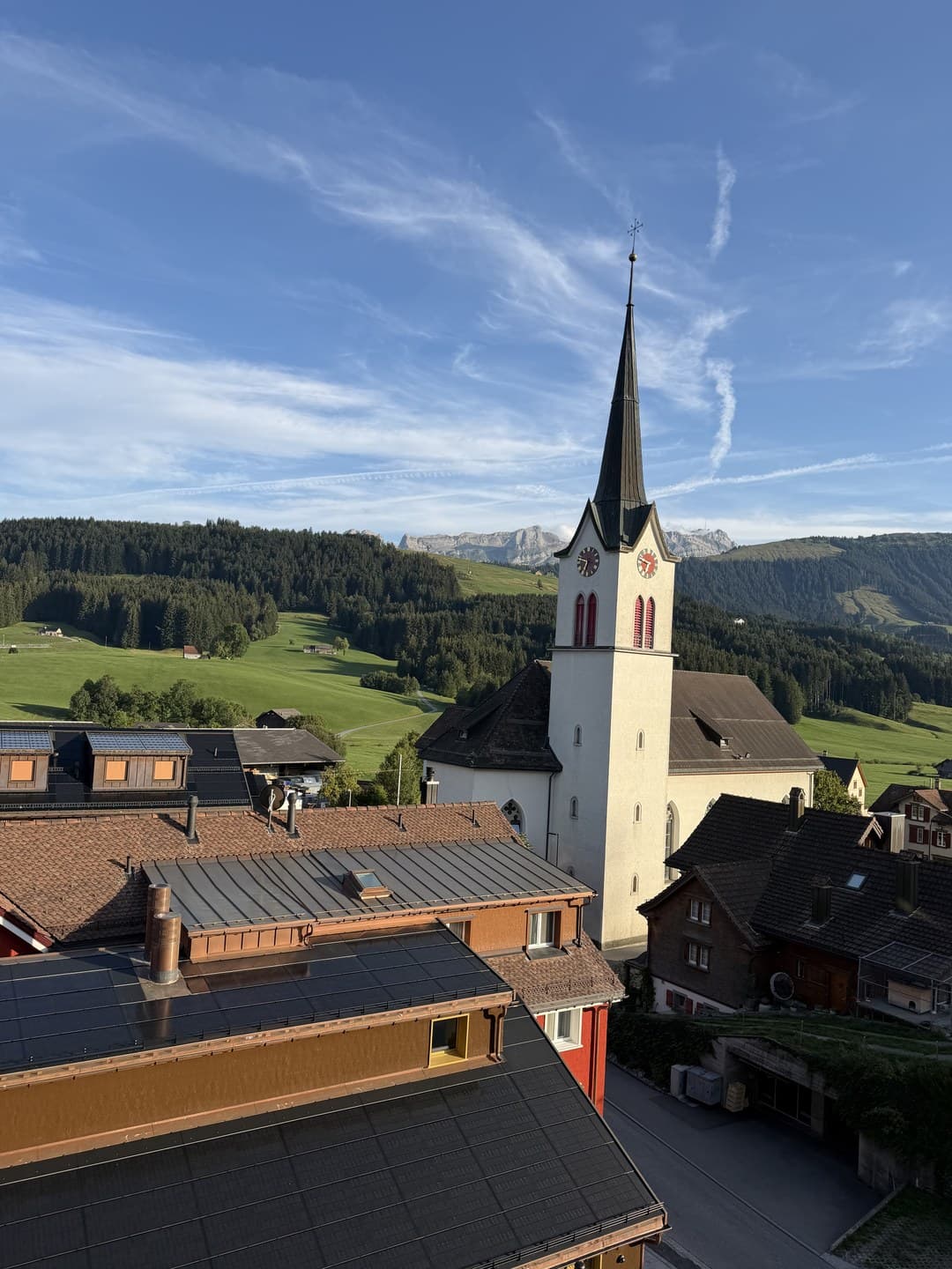 Gonten village church with the Alpstein behind